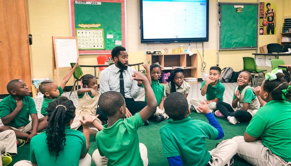 PHOTO: Sammy Rigaud, a second-grade teacher at The Kindezi School at Old Fourth Ward in Atlanta, Georgia, teaches in the classroom to students.