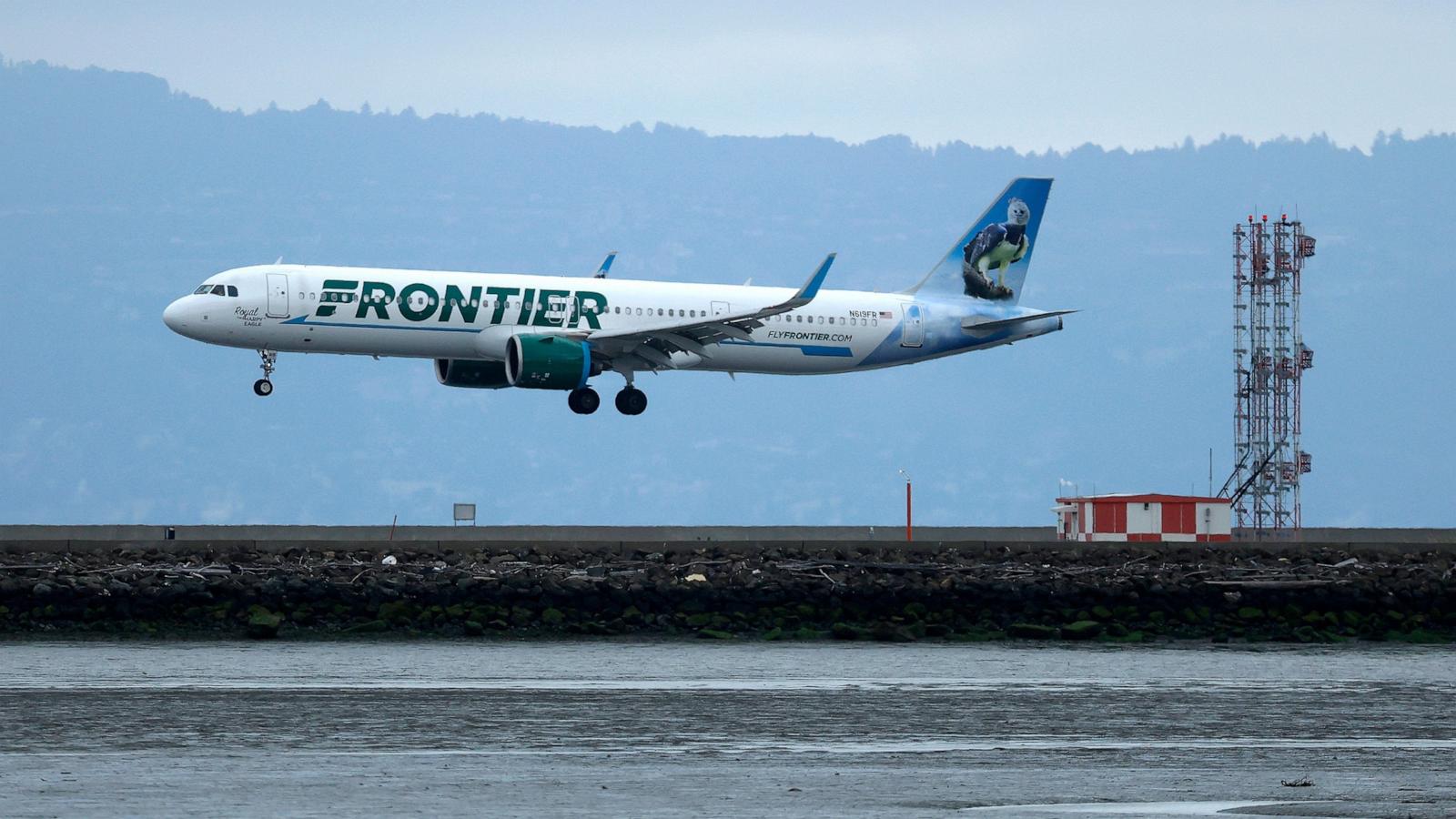 PHOTO: A Frontier Airlines plane lands at San Francisco International Airport on April 15, 2025 in San Francisco, California.