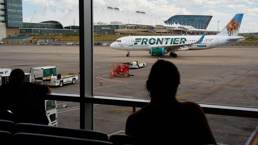 PHOTO: An Airbus A320-251N aircraft, operated by Frontier, arrives at the Jeppesen Terminal at Denver International Airport in Denver, Aug. 19, 2023.