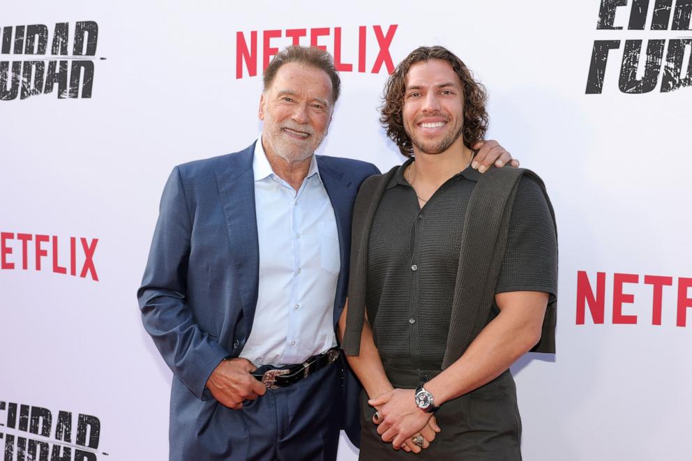 PHOTO: Arnold Schwarzenegger and Joseph Baena attend Netflix's "FUBAR" Season 2 Los Angeles Premiere, June 11, 2025 in Los Angeles.