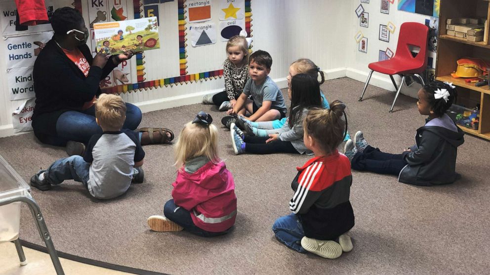 PHOTO: Monique Nash, a preschool teacher, works with students at Funtime Preschool in Clinton, Miss.