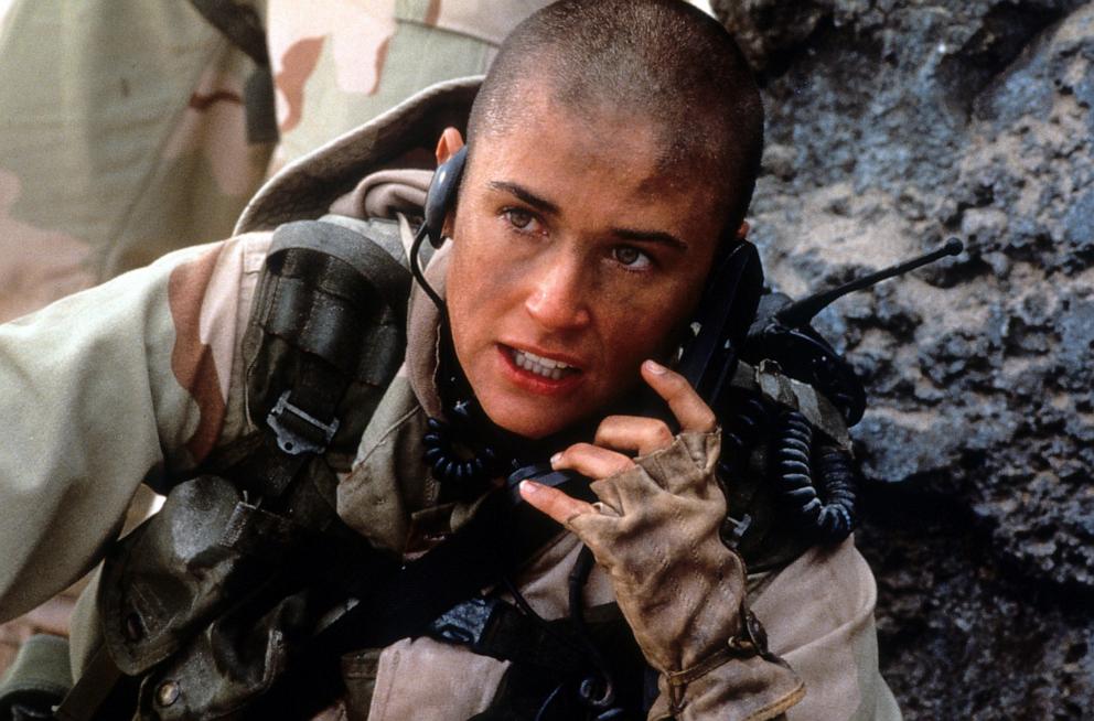 PHOTO: Demi Moore talking on walkie talkie in a scene from the film 'G.I. Jane', 1997.