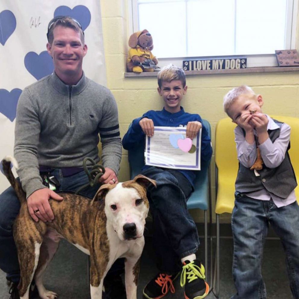 VIDEO: Boy gets adopted on the same day his family adopts a dog