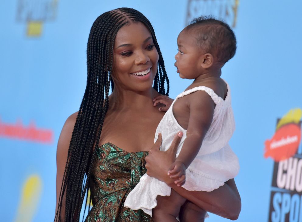 PHOTO: Gabrielle Union, left, and her daughter Kaavia James Union Wade arrive at the Kids' Choice Sports Awards on July 11, 2019, in Santa Monica, Calif.