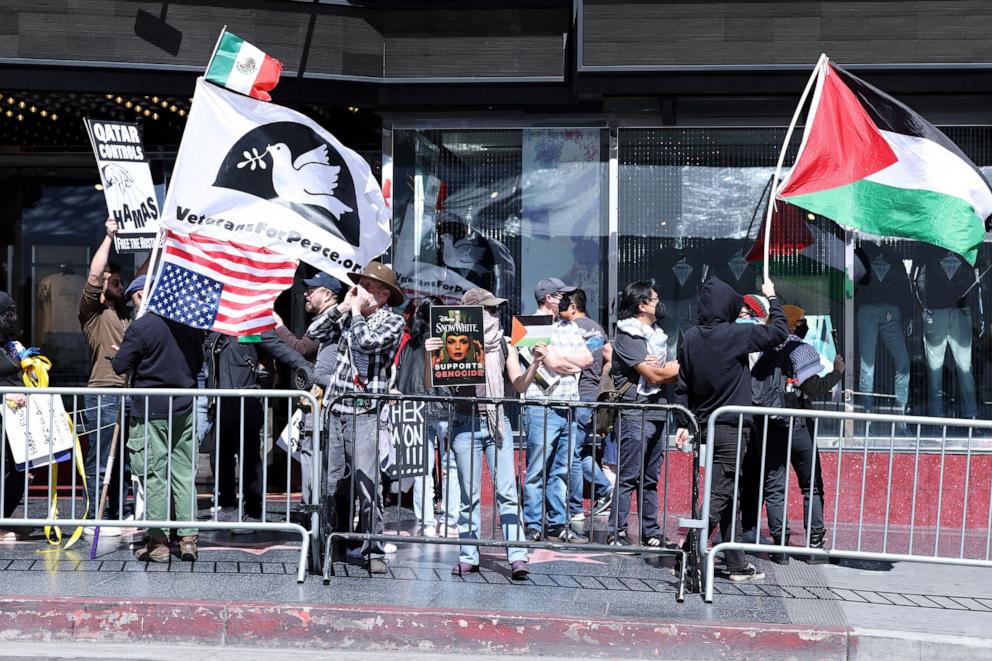 PHOTO: Pro-Israel and pro-Palestinian people protest in front of the El Capitan Theater during Israeli actress Gal Gadot's Hollywood Walk of Fame Star Ceremony in Los Angeles, California, on March 18, 2025.