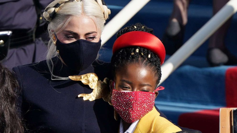 PHOTO: Lady Gaga poses with Amanda Gorman during the inauguration of Joe Biden as the 46th President of the United States on the West Front of the U.S. Capitol in Washington, D.C., Jan. 20, 2021.