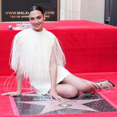 PHOTO: Gal Gadot poses with her new star at a ceremony honoring her on the Hollywood Walk of Fame, March 18, 2025, in Los Angeles.