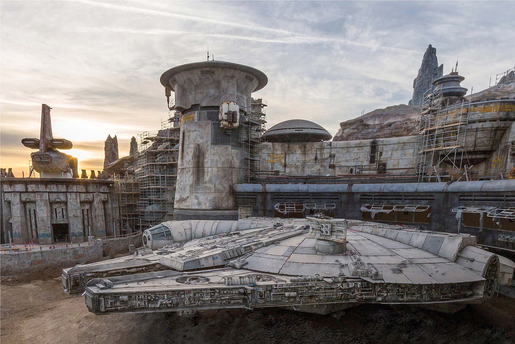 PHOTO: The completed Millennium Falcon sits amid Star Wars: Galaxy's Edge buildings still under construction at Disneyland in this image released in December 2018.