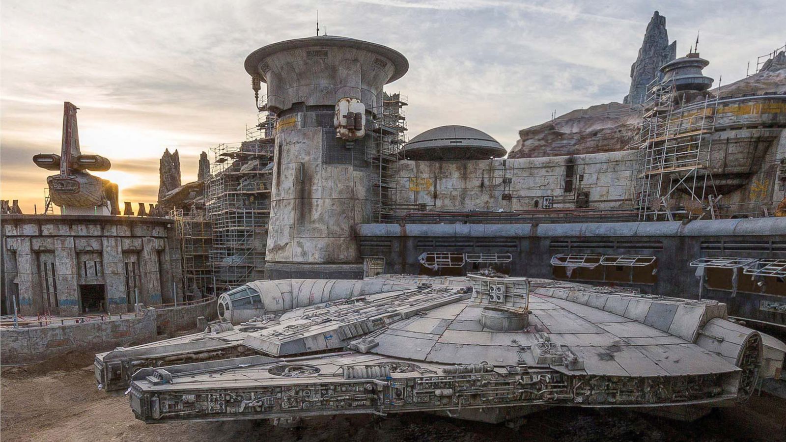 PHOTO: The completed Millennium Falcon sits amid Star Wars: Galaxy's Edge buildings still under construction at Disneyland in this image released in December 2018.