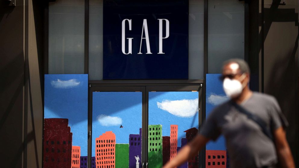 PHOTO: A pedestrian walks by the closed GAP flagship store on Aug. 18, 2020, in San Francisco.