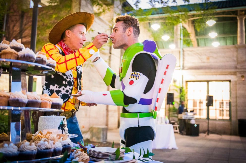 PHOTO: Grooms Garrett Smith and Jason Bitner dressed as Woody and Buzz Lightyear at Disney-themed wedding.