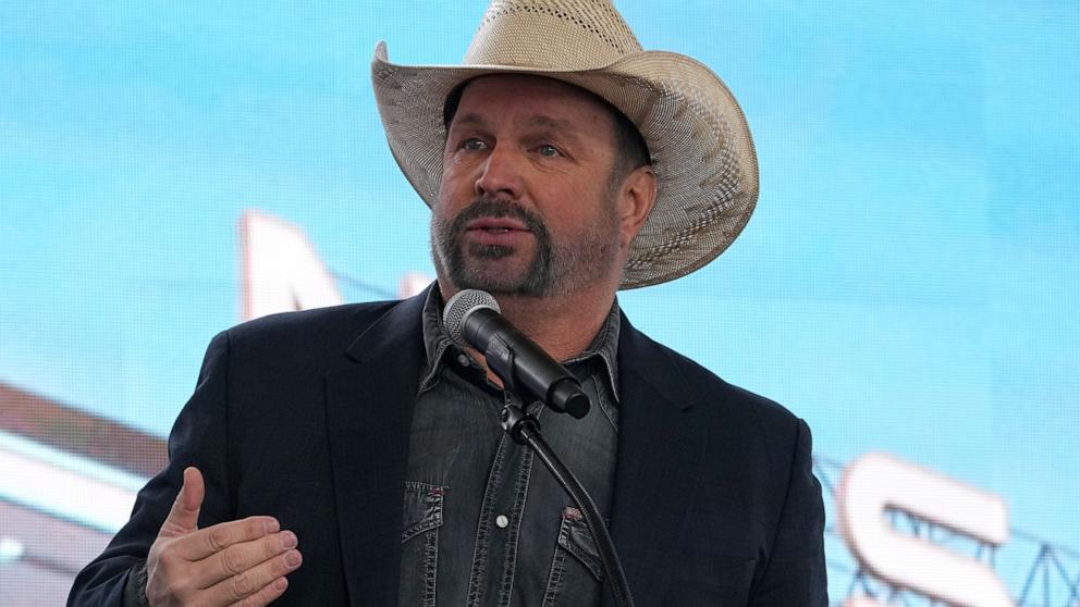 PHOTO: Garth Brooks speaks during a groundbreaking ceremony for the Tennessee Titans new NFL football stadium, Feb. 29, 2024, in Nashville, Tenn. 