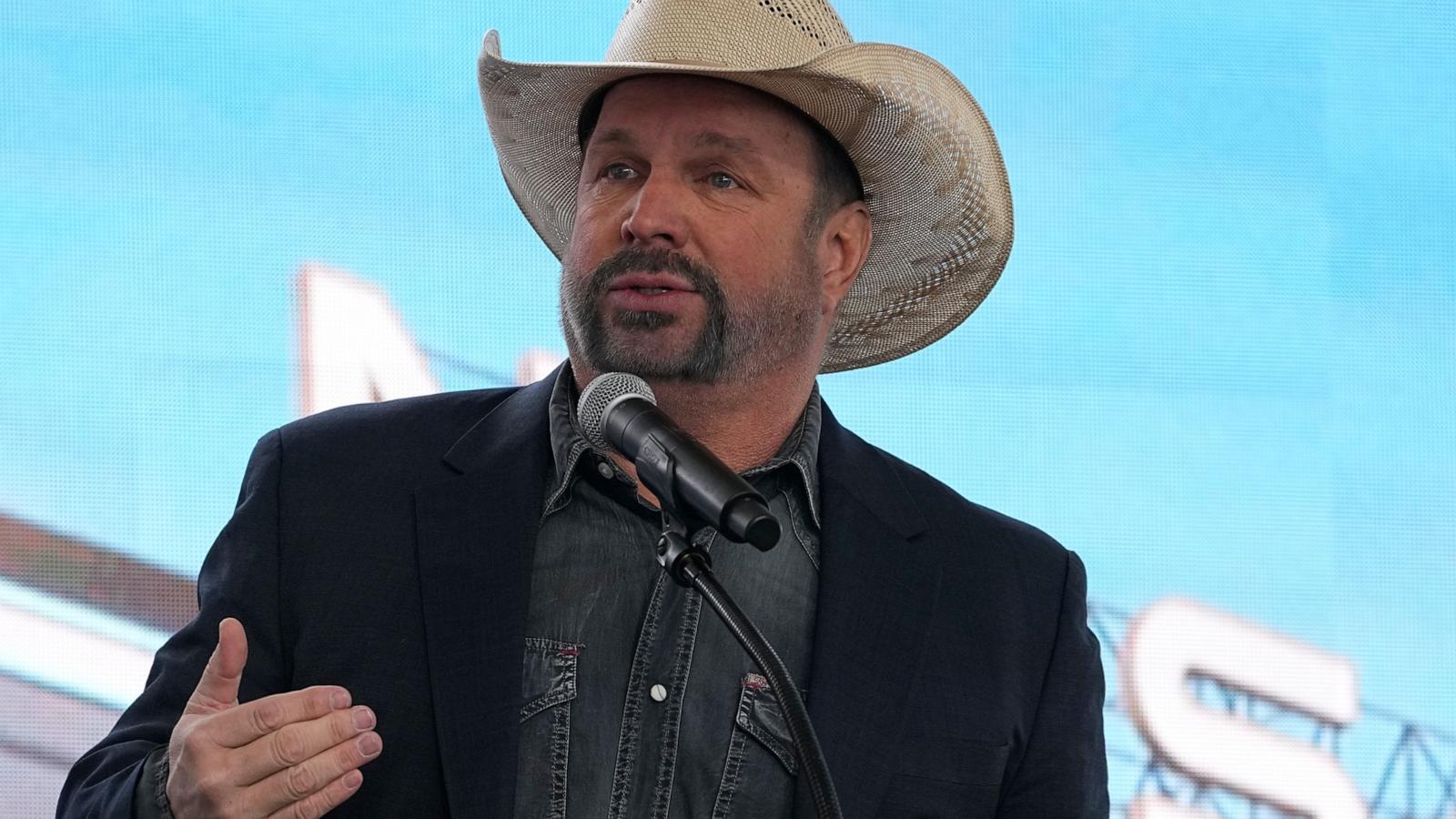 PHOTO: Garth Brooks speaks during a groundbreaking ceremony for the Tennessee Titans new NFL football stadium, Feb. 29, 2024, in Nashville, Tenn.