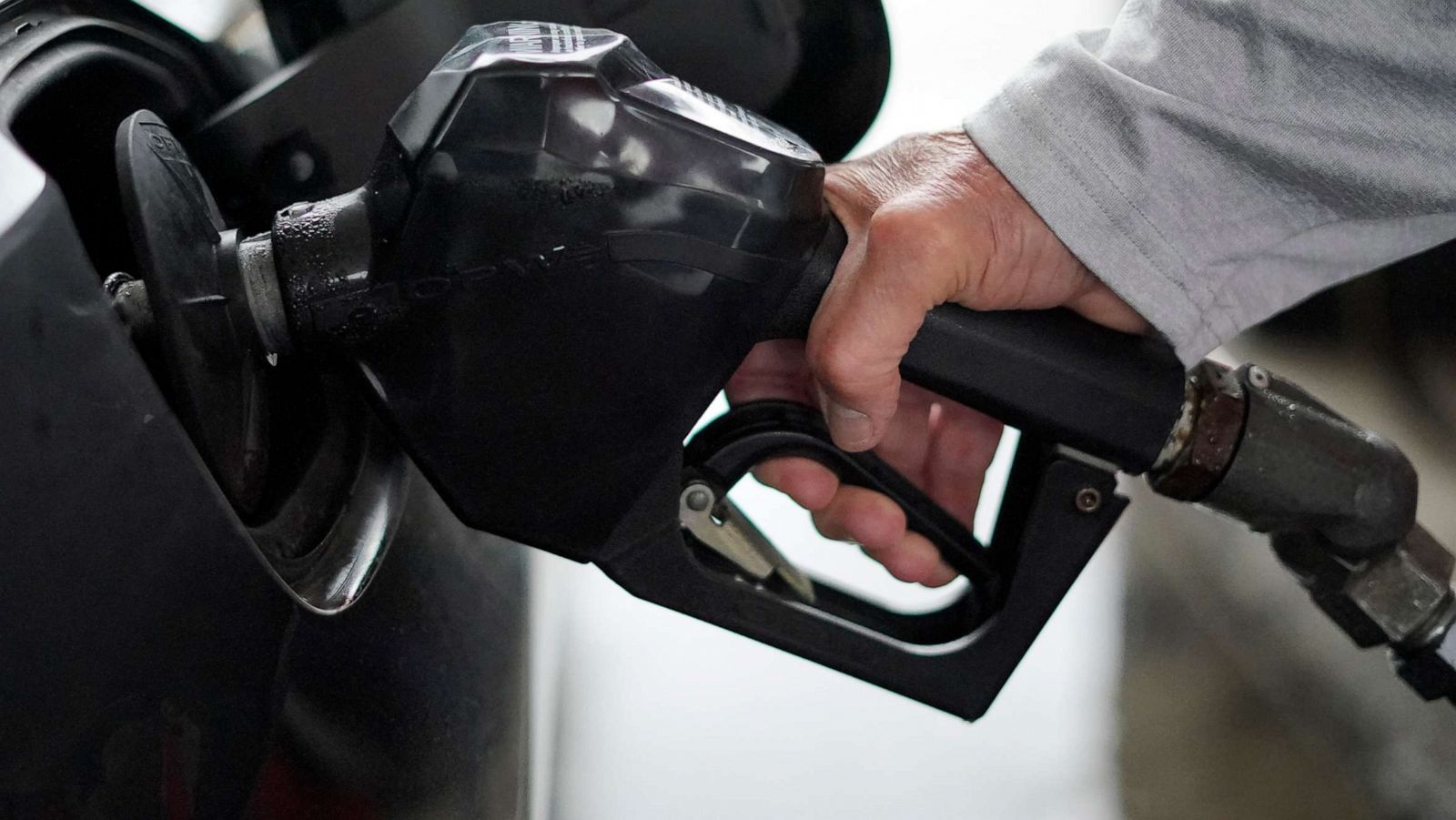 PHOTO: A man fills his car with regular unleaded gas at $4.19 per gallon at a Sheetz store in Sewickley, Pa., March 7, 2022.