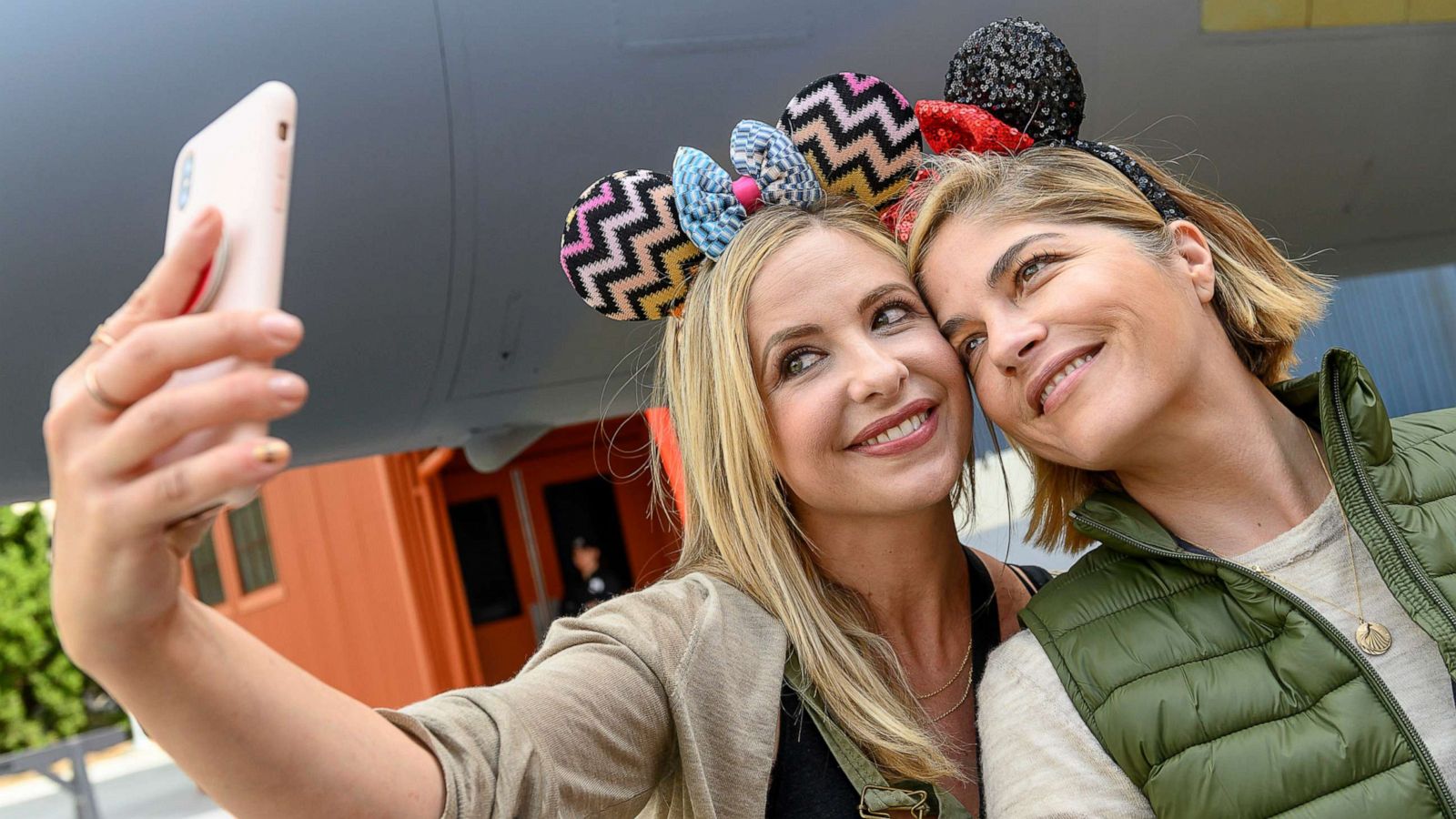 PHOTO: Sarah Michelle Gellar, left, and Selma Blair share a special moment with Captain Marvel at Disney California Adventure Park in Anaheim, Calif., March 28, 2019.