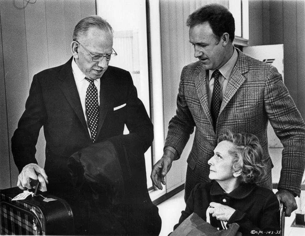 PHOTO: Melvyn Douglas and Gene Hackman at airport with Dorothy Stickney in a scene from the film 'I Never Sang For My Father', 1970.