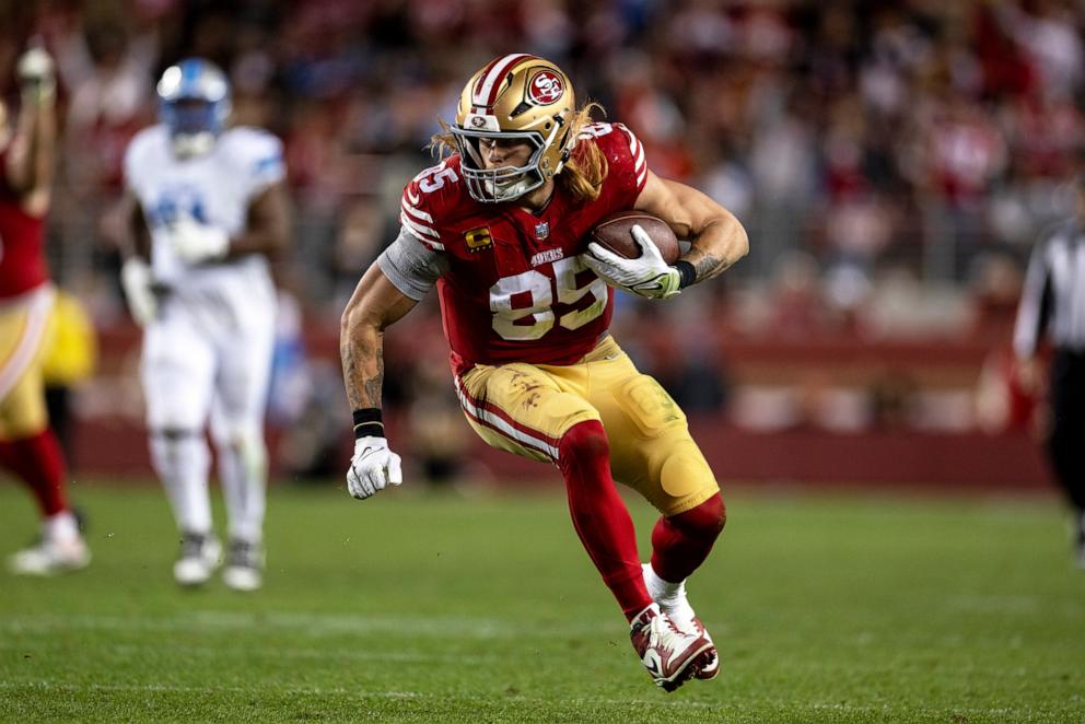 PHOTO: In this Dec. 30, 2024, file photo, George Kittle of the San Francisco 49ers runs with the ball during an NFL Football game against the Detroit Lions at Levi's Stadium in Santa Clara, Calif.