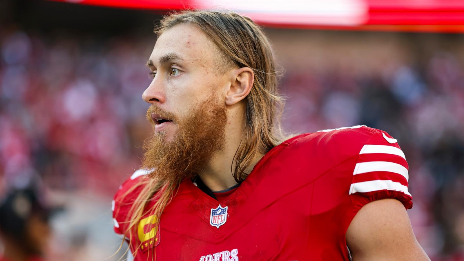 PHOTO: In this Dec. 8, 2024, file photo, tight end George Kittle of the San Francisco 49ers stands on the sidelines prior to an NFL football game against the Chicago Bears, in Santa Clara, Calif.