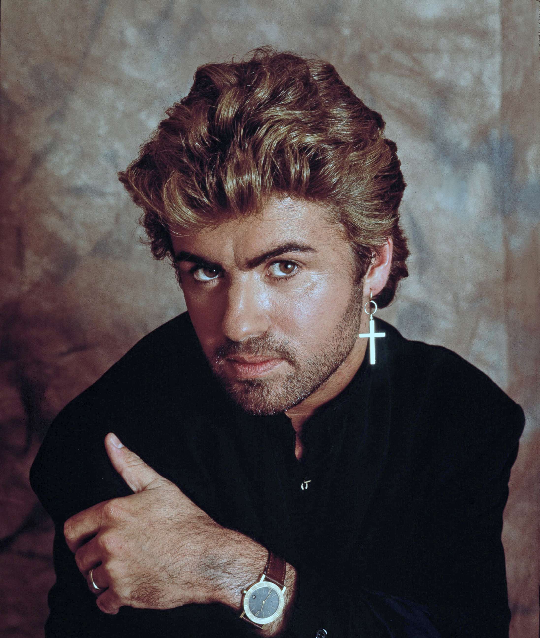 PHOTO: George Michael poses for a studio portrait in 1987 in London. 