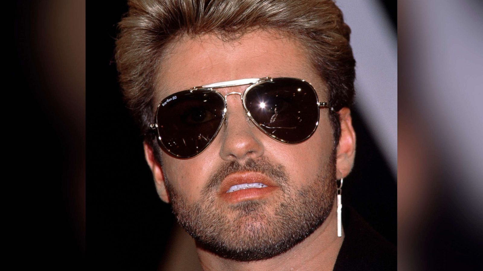 PHOTO: George Michael poses for a portrait on April 12, 1988 in Rotterdam, The Netherlands.