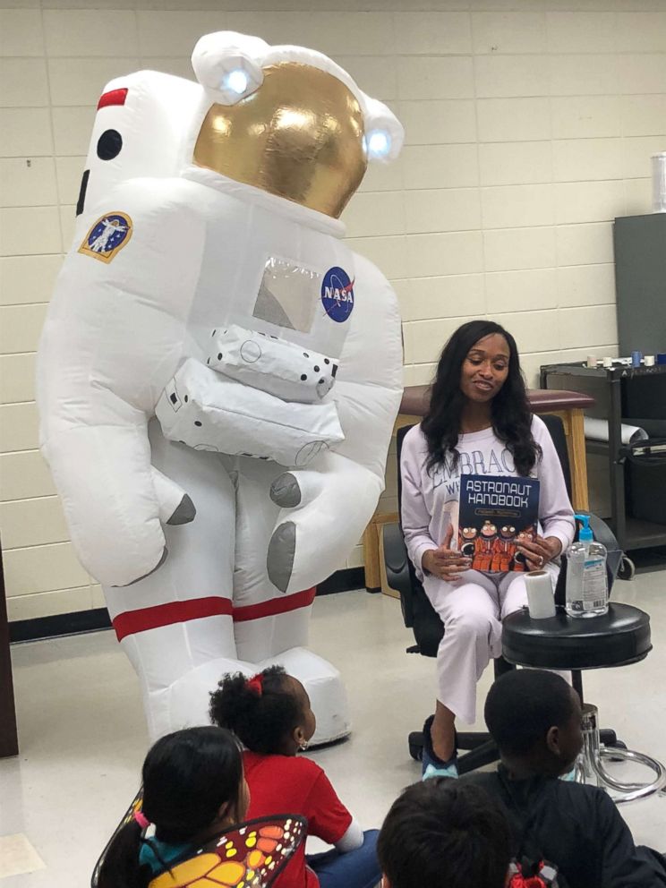 PHOTO: Dr. Belinda George reads to students at Homer Elementary School. 