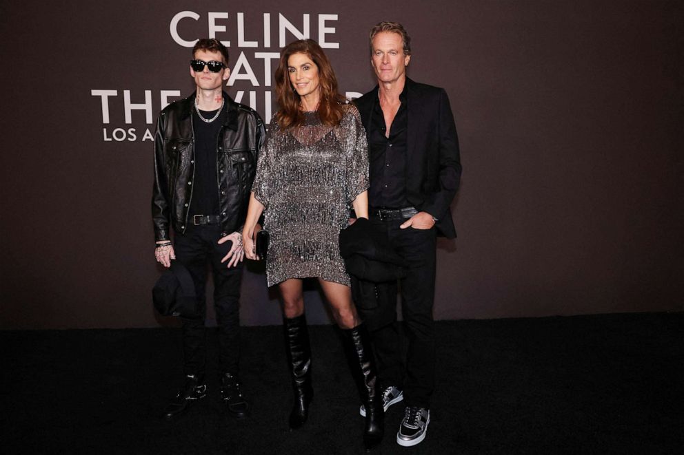 PHOTO: Cindy Crawford with her husband Rande Gerber and son Presley Walker Gerber attend the Celine Fall Winter 2023 fashion show at The Wiltern theatre in Los Angeles, Dec. 8, 2022.