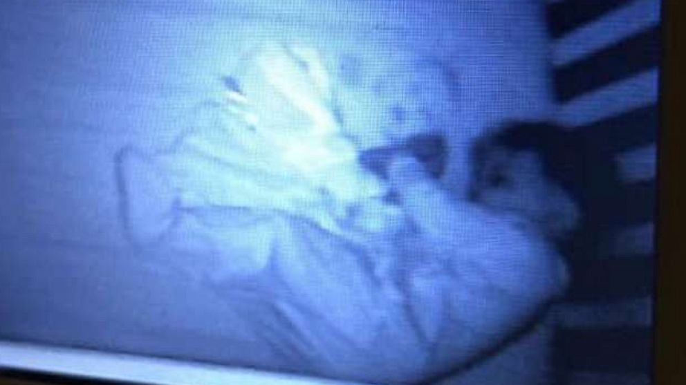 An Illinois mother was spooked when she saw this "ghost baby" in her son's crib on her baby monitor.