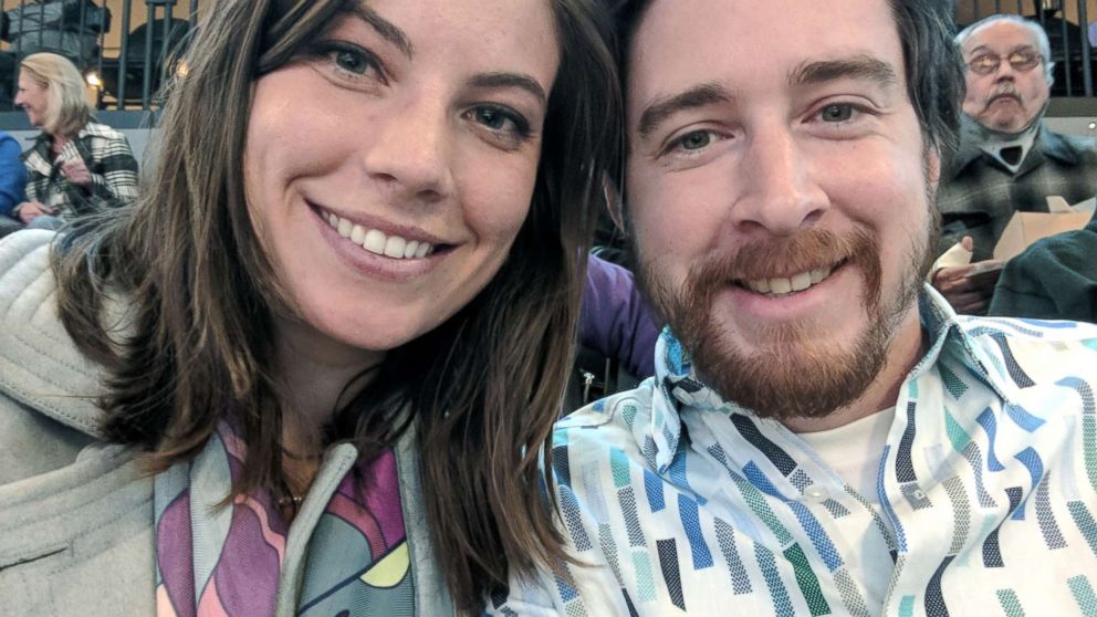 PHOTO: Katherine Kellogg and her husband pose at a basketball game they gave each other as an experience gift for Christmas.