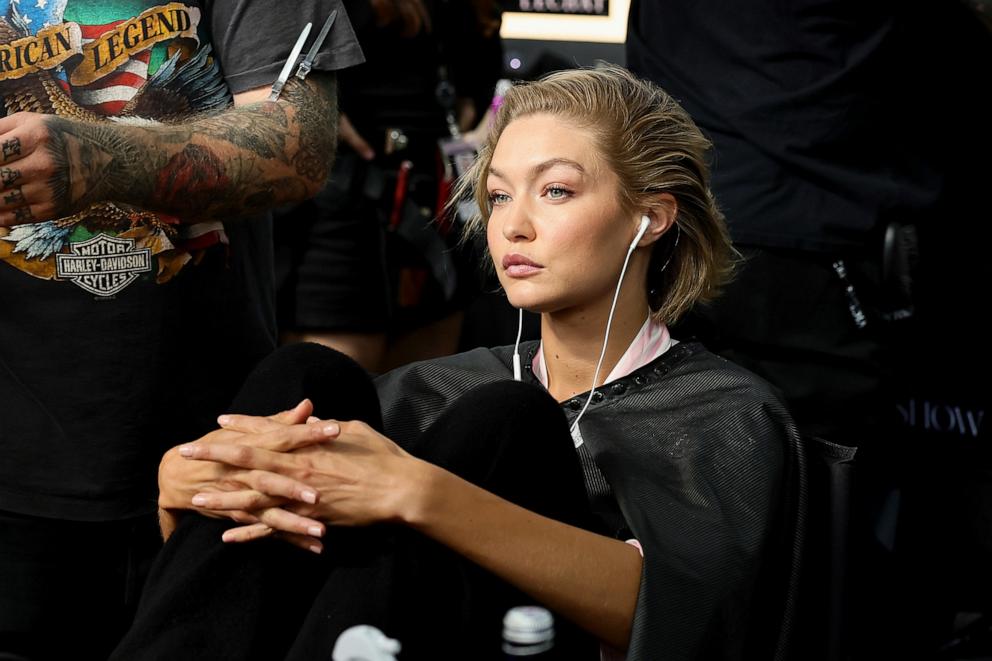 PHOTO: Gigi Hadid prepares backstage during the Victoria's Secret Fashion Show 2024 at Duggal Greenhouse on Oct. 15, 2024, in Brooklyn, New York. 