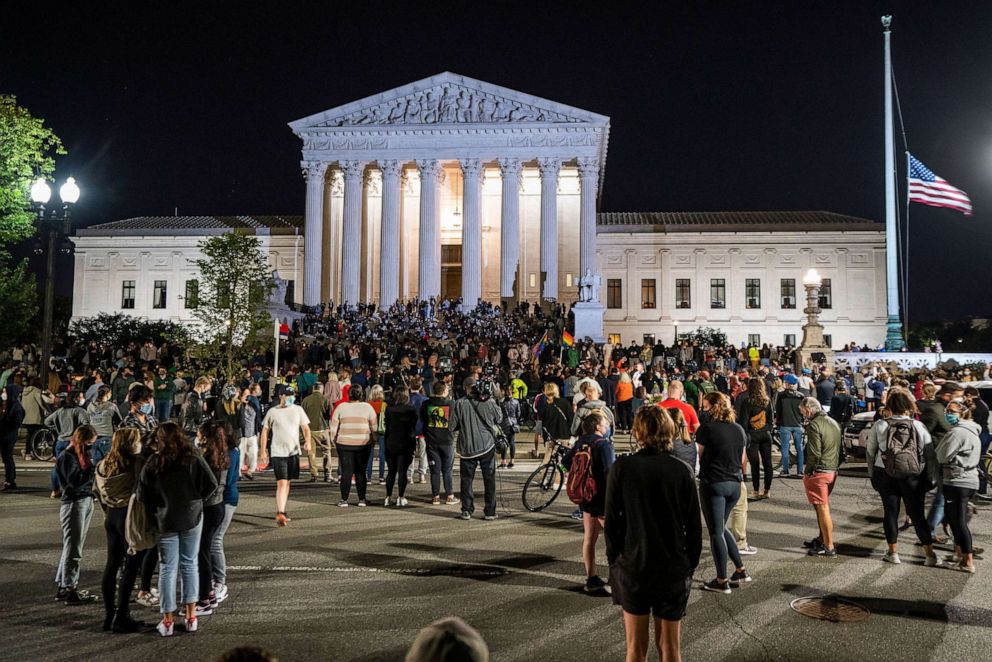 PHOTO: Mourners gather on the steps of the Supreme Court in Washington, Sept. 18 2020, after hearing the news of Associate Justice Ruth Bader Ginsburg death from pancreatic cancer.