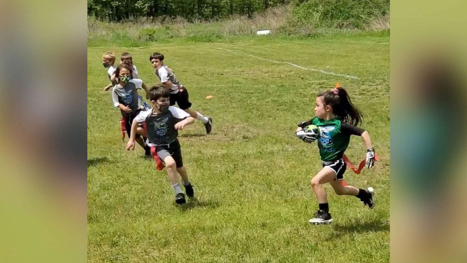 PHOTO: Alessia Ashley, 6, competes during a football game in Westchester County, New York, on May 16.