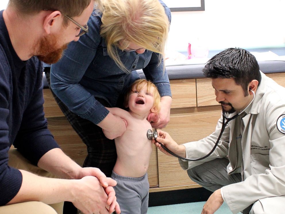 PHOTO: Pediatric Cadiologist, Michael Perez listens to Eloise Hoffmans heart at the Lurie Childrens at Northwestern Medicine Central DuPage Hospital.