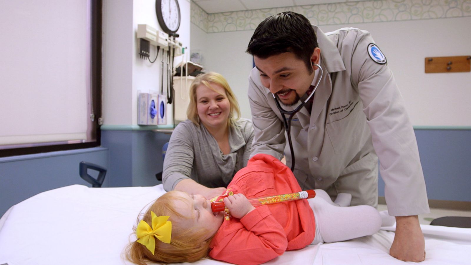 PHOTO: Pediatric Cadiologist, Michael Perez listens to Eloise Hoffman's heart at the Lurie Children's at Northwestern Medicine Central DuPage Hospital.