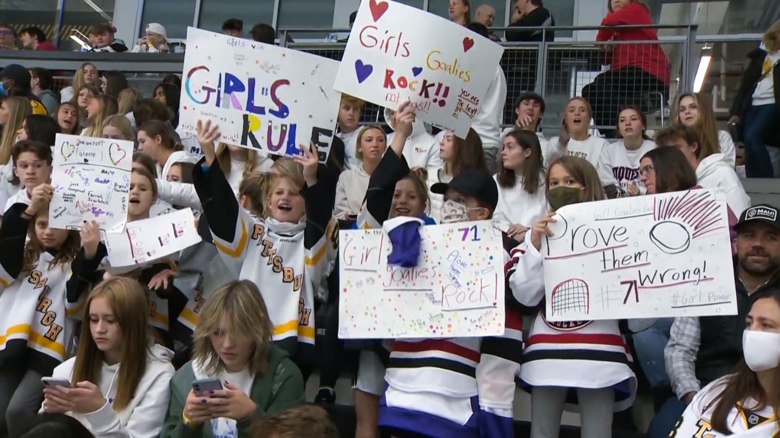 PHOTO: People in the stands cheer for the Mars Area High School hockey team at a game in Cranberry Township, Pa., Nov. 8, 2021.