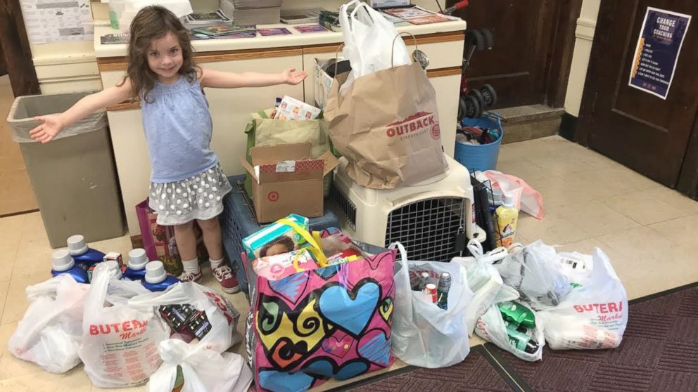 PHOTO: Florence Wisniewski, 4, stands with some of the donations she has raised for Hurricane Florence victims.