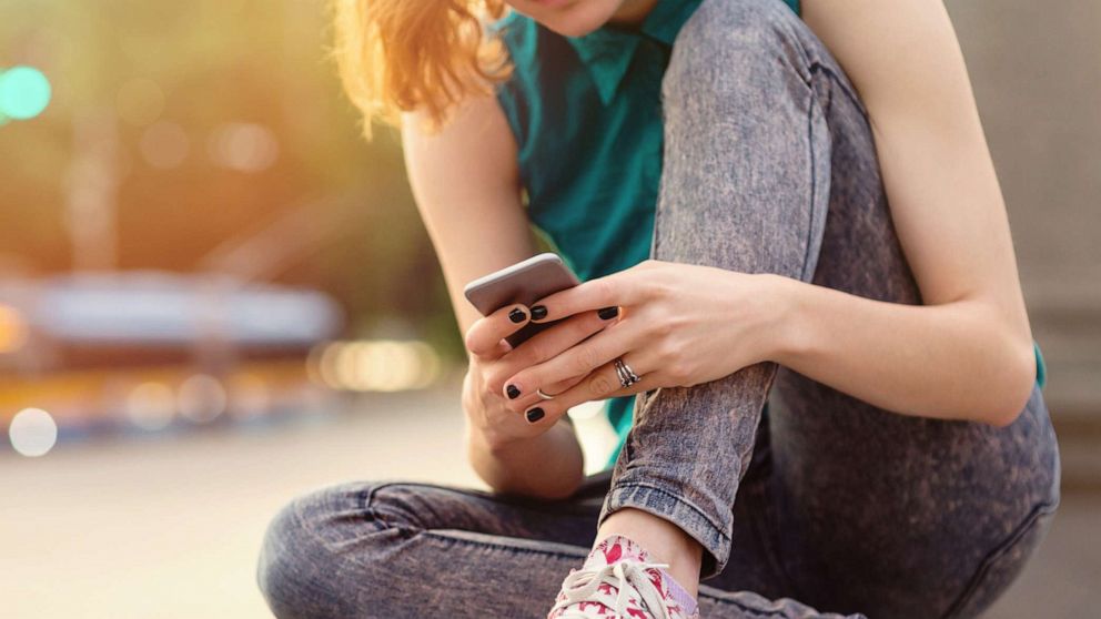 PHOTO: In this undated file photo, a teenage girl is shown using a cell phone.