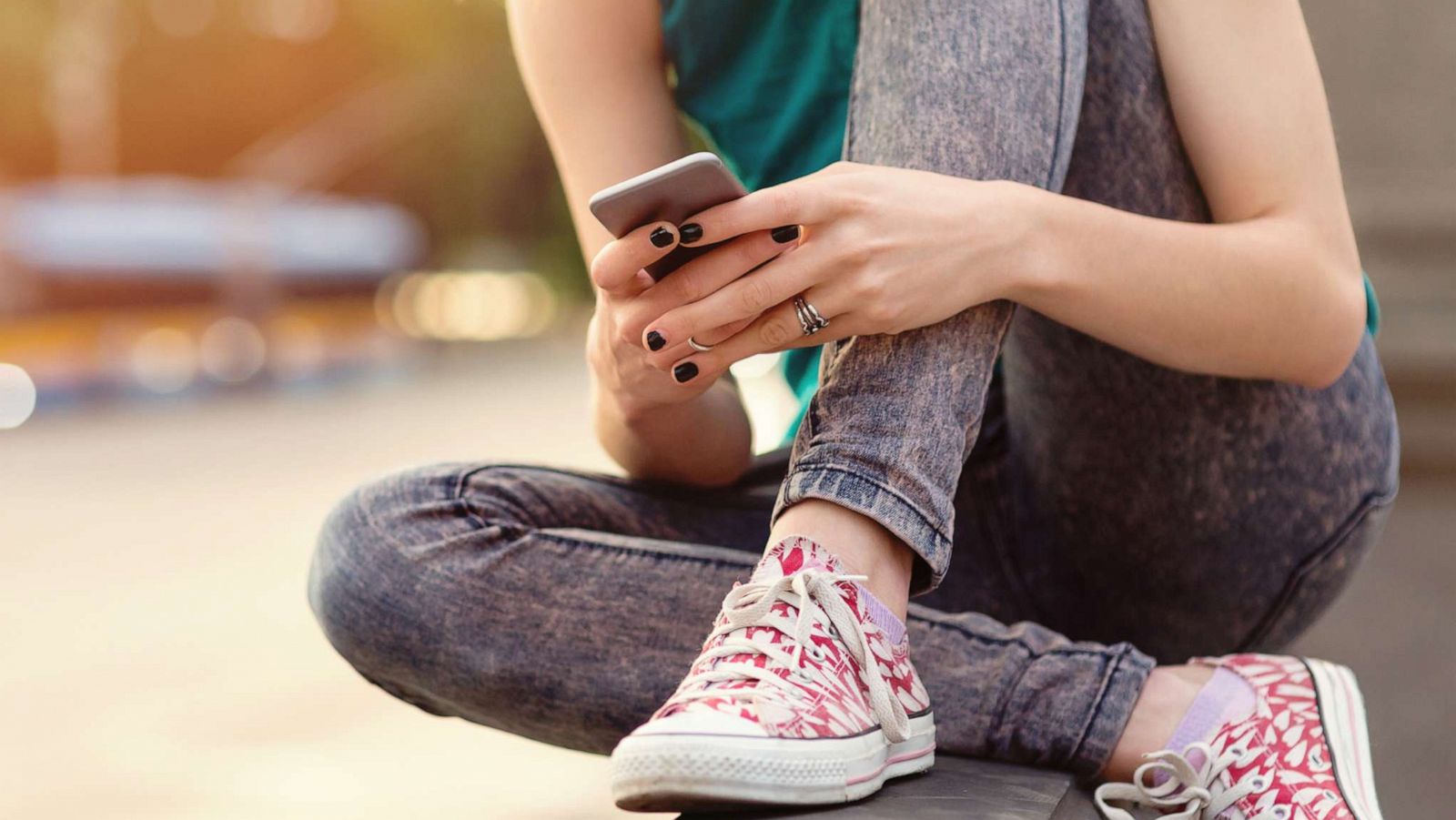 PHOTO: In this undated file photo, a teenage girl is shown using a cell phone.