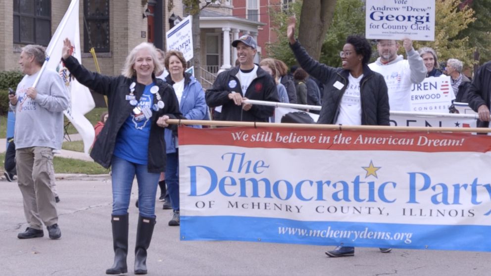 PHOTO: Democratic congressional candidate Lauren Underwood walks in the Settlers Day parade in Marengo, Illinois.