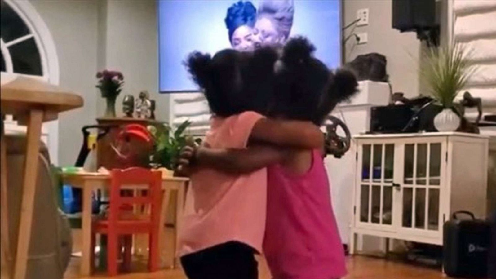 PHOTO: Savannah and Nzinga, both 2, dance while watching Beyonce's "Brown Skin Girl" music video.