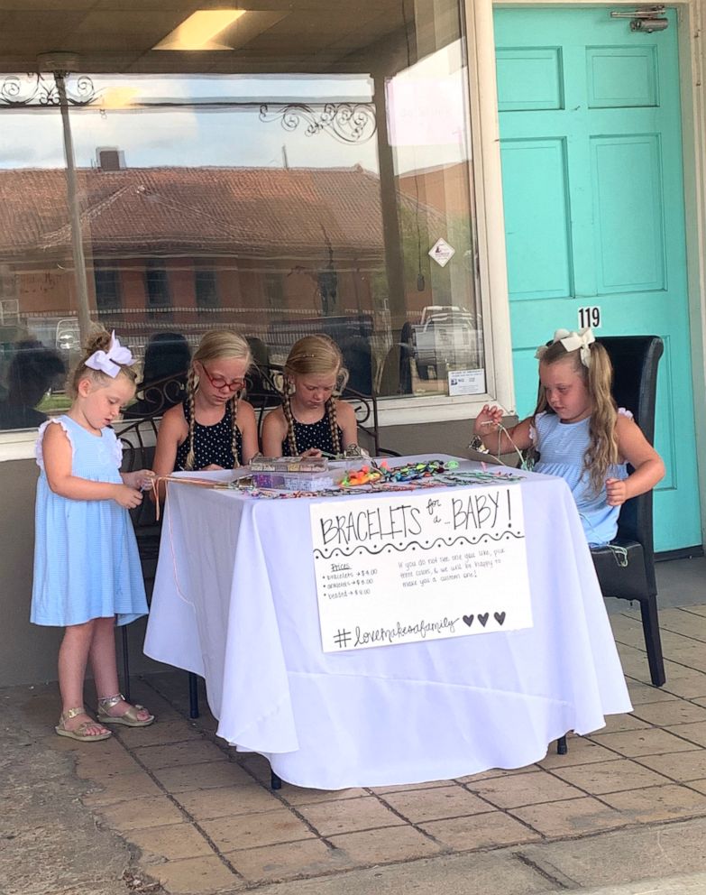 PHOTO: Evelyn, 4, Susanna, 11, Mary Anson, 11 and Elenor Tate, 7 of Brookhaven, Mississippi started a bracelet crafting business in hopes to raise money for adoption fees.