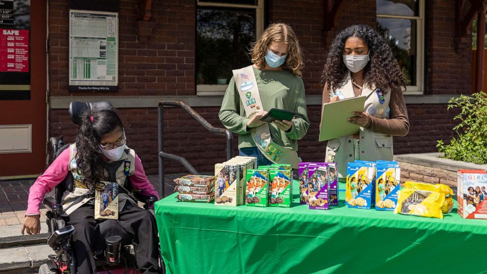 PHOTO: A press image provided by the Girl Scouts of the USA shows scouts selling cookies. 