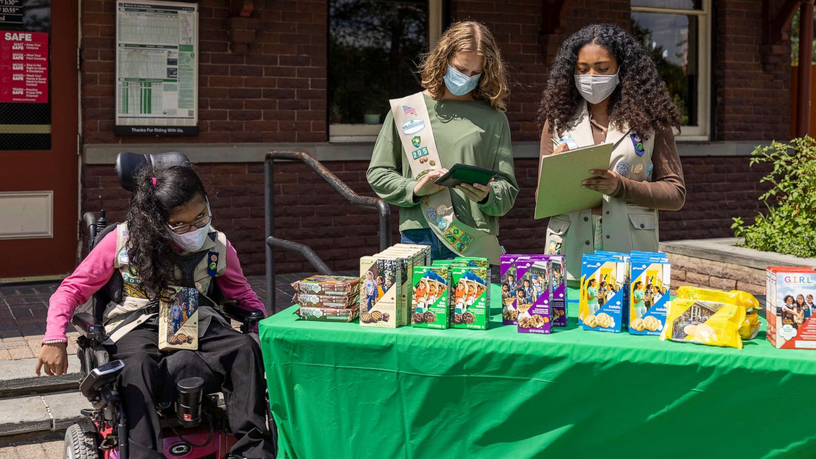 PHOTO: A press image provided by the Girl Scouts of the USA shows scouts selling cookies.