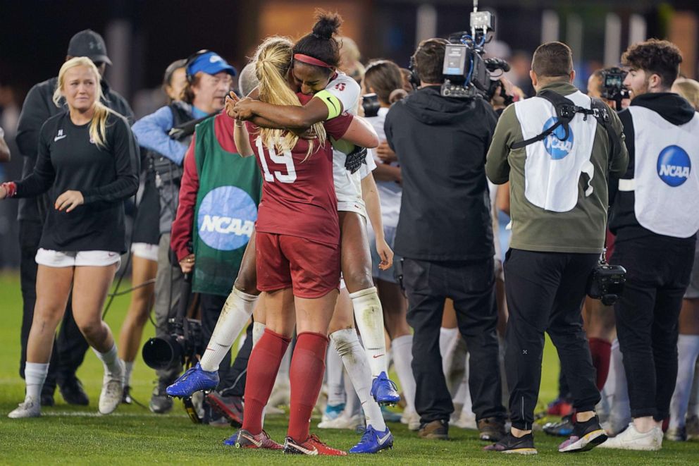 PHOTO: Katie Meyer #19 and Naomi Girma #2 of the Stanford Cardinal celebrate during a game between UNC and Stanford Soccer W at Avaya Satdium on Dec. 8, 2019 in San Jose, Calif.