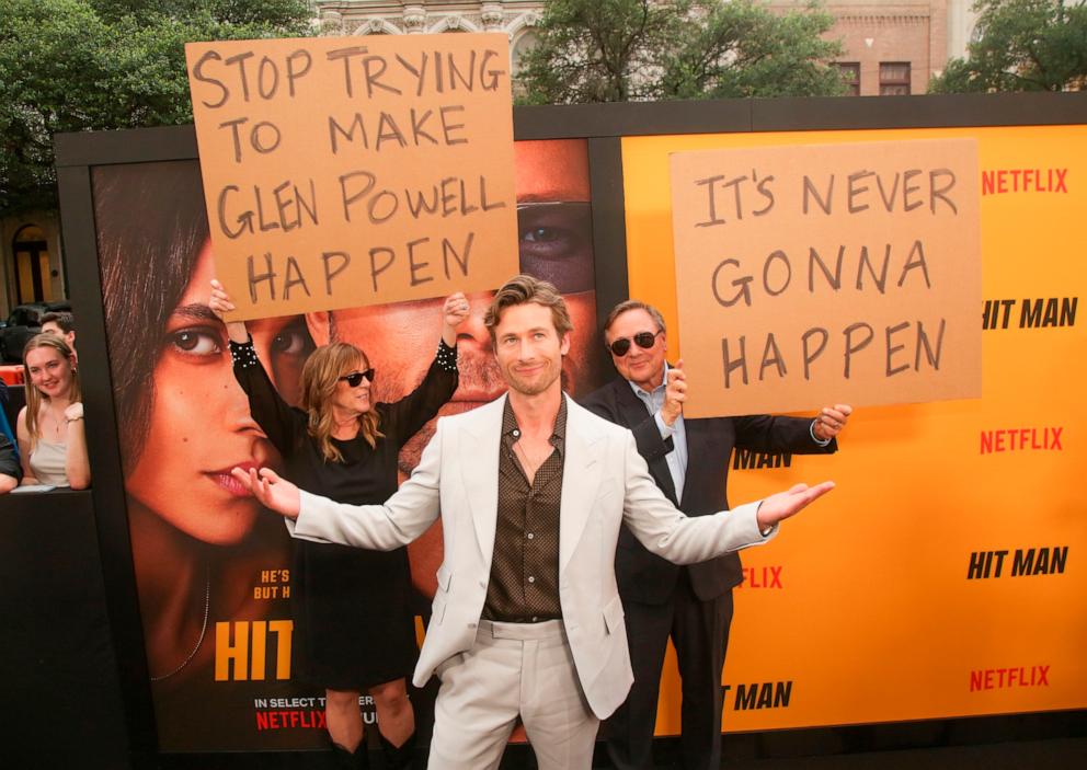 PHOTO: Glen Powell, center, along with his parents, Cindy Powell, left, and Glen Powell, Sr, arrive at the premiere of "Hit Man" on Wednesday, May 15, 2024, at The Paramount Theatre in Austin, Texas. 