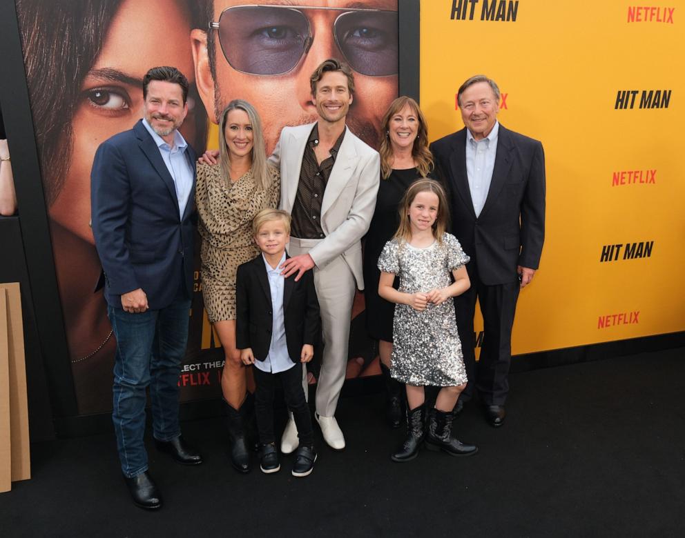 PHOTO: Glen Powell, center, and guests attend the premiere of Netflix's "Hit Man" & Glen Powell's induction into the Texas Film Hall Of Fame at The Paramount Theatre, May 15, 2024, in Austin, Texas. 