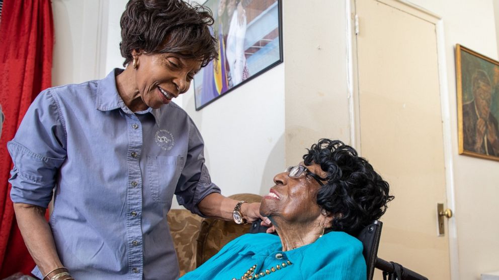 Alelia Murphy, right, seen with her nurse, Natalia Mhlambiso. Murphy recently turned 114 years old.