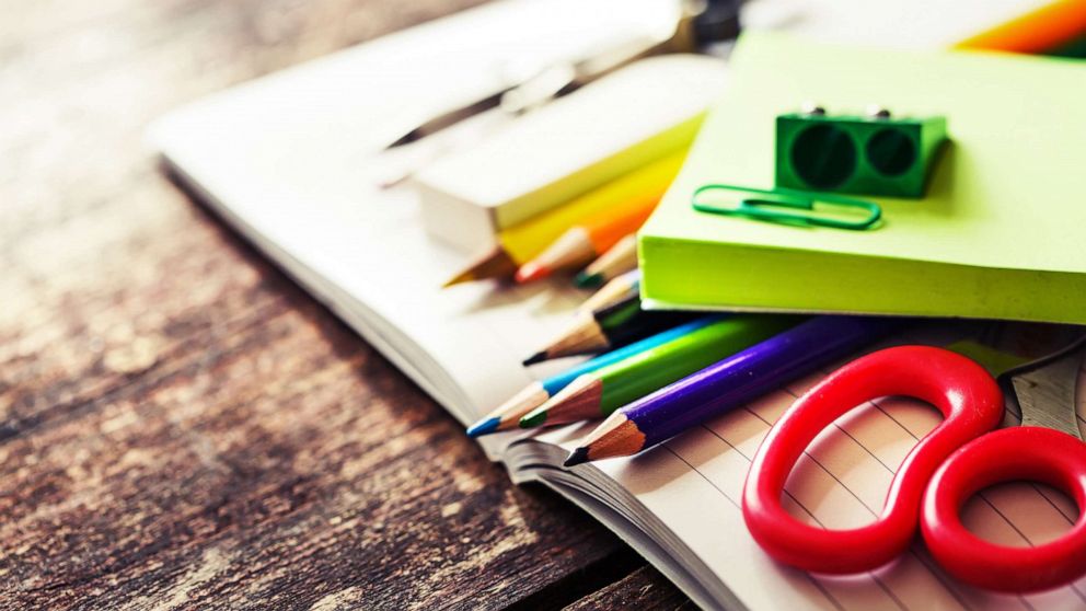 PHOTO: School supplies sit on wooden desk in an undated stock photo.