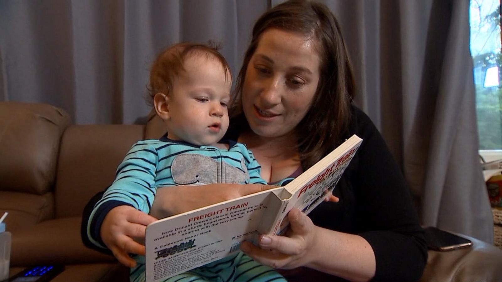 PHOTO: Gina Balzano reads to her son Logan.