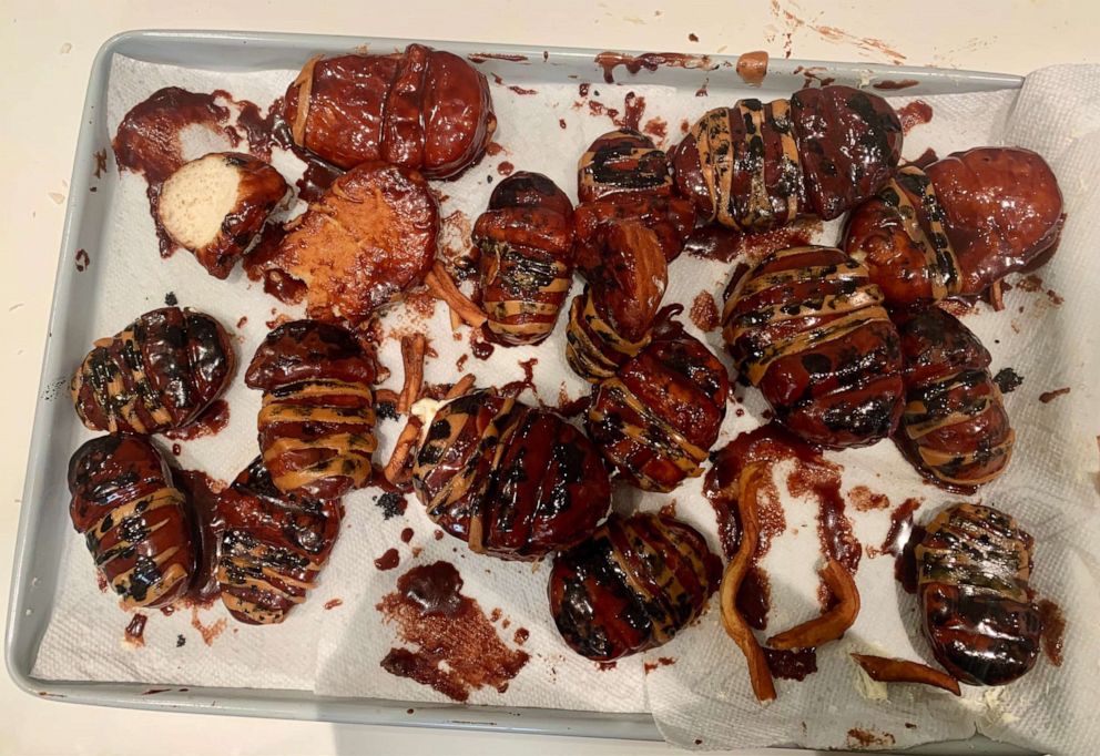 PHOTO: Making the cockroach Boston cream donuts was a very messy business as the caramel strips were sticky and the chocolate glaze and black frosting made them hard to handle without making a mess.