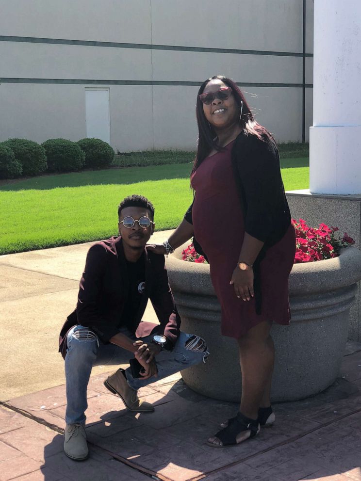 PHOTO: Dacavien Reeves poses with his mom in this family photo.